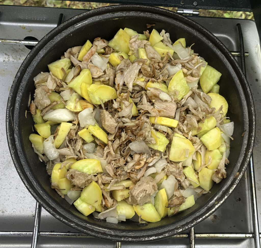 Shredded jackfruit, black beans, corn, yellow squash, onions, seasonings
